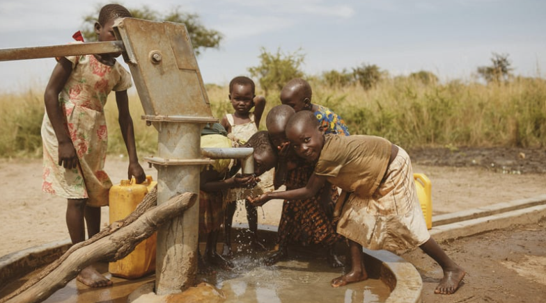 Children at water pump